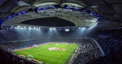 Floodlit football stadium at night, illustrating Tottenham's record 2026 summer transfer spending