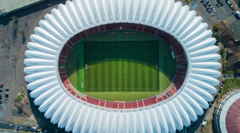 Aerial view of a packed soccer stadium, symbolizing the busy 2026 summer transfer window