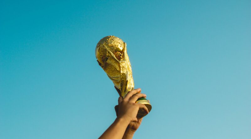 Football trophy and celebration marking the 2026 World Cup awards