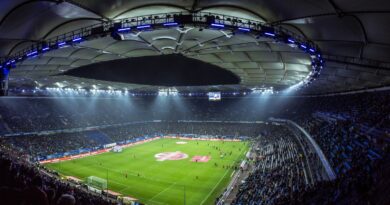 Floodlit football stadium at night, illustrating Premier League spending in the summer 2026 transfer window