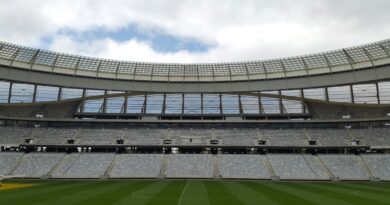 A large football stadium under a cloudy sky, illustrating Newcastle United's summer 2026 transfer teardown and squad rebuild