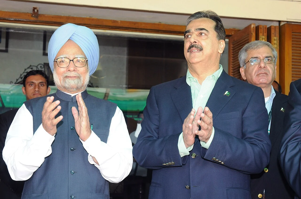 Manmohan Singh and Yousuf Raza Gilani watching the India–Pakistan World Cup semi-final at Mohali in 2011.