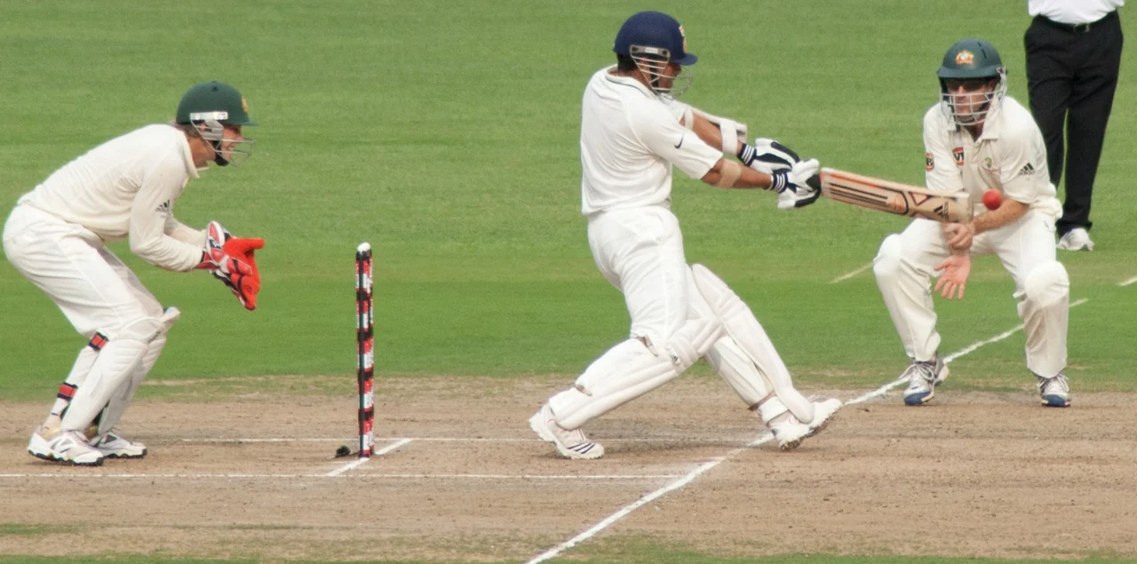 Sachin Tendulkar drives a ball against Australia in a Test at Bengaluru in October 2010.